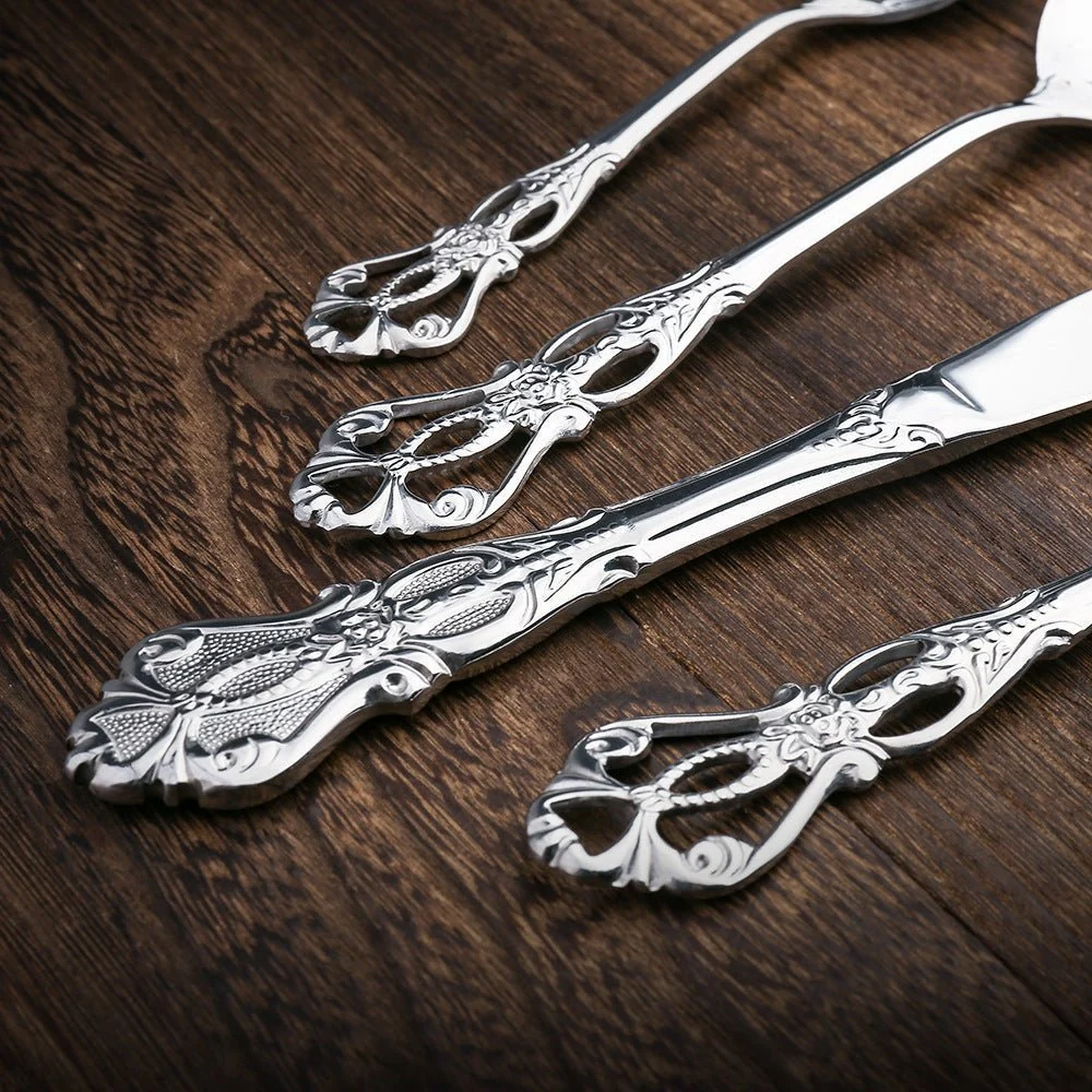 Elegantes Edelstahl Besteckset in Goldoptik - 24-teiliges Menübesteck mit prunkvollem Griff