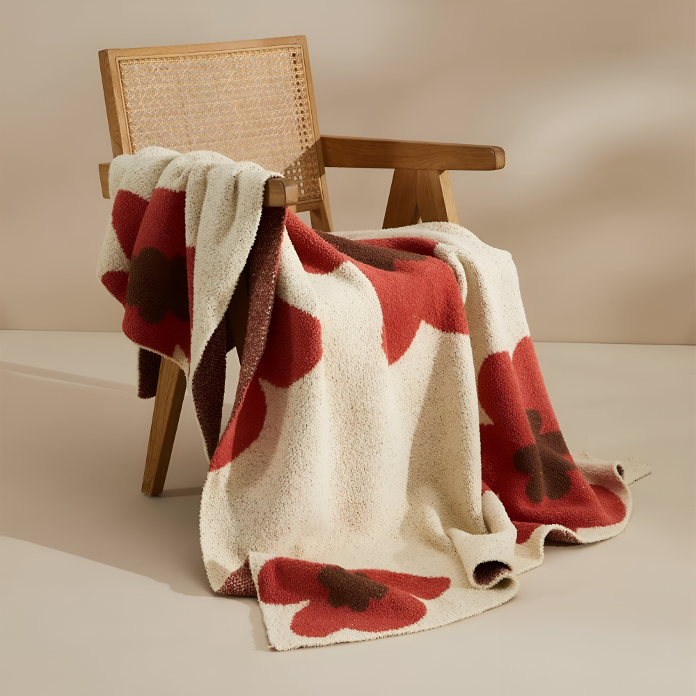 Blumenmuster Strick Kusheldecke – Gemütliche und Stilvolle Wohndecke für Ihr Zuhause