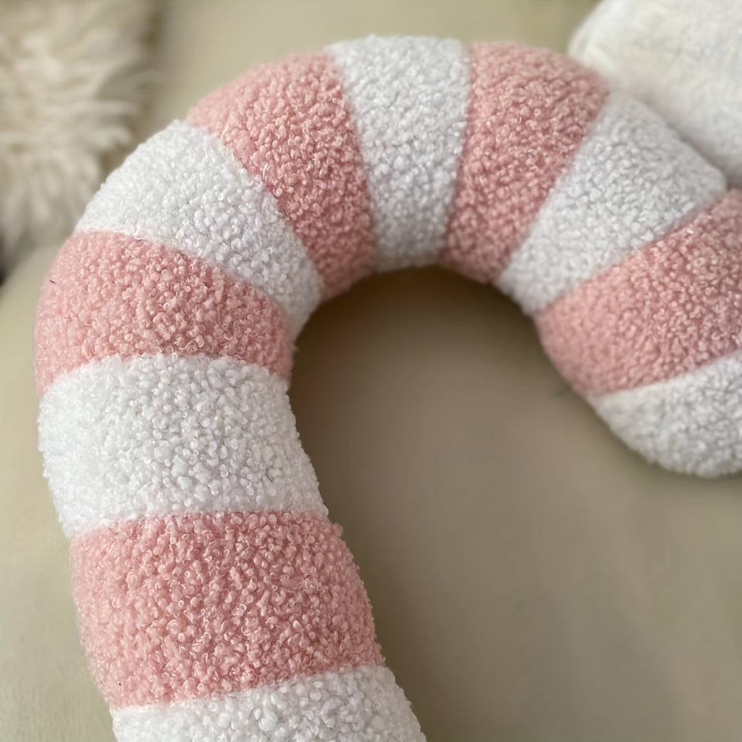 Nahaufnahme des rosa Zuckerstange Kissens aus Plüsch