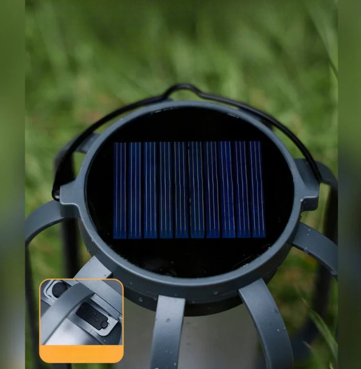 Andere Solarleuchte mit grauem Gehäuse und Standfüßen, Detail des Solarpanels